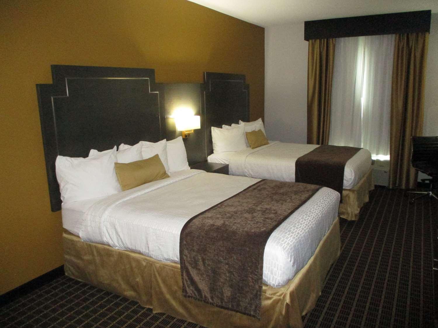 Best Western Plus Regency Park Walker Bagian luar foto